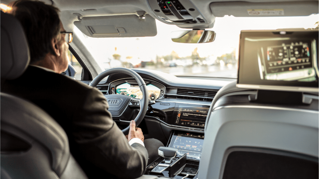 A man driving a car