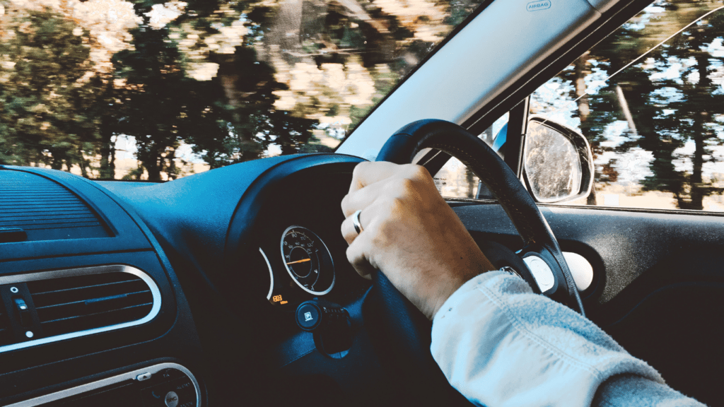 Man driving a car