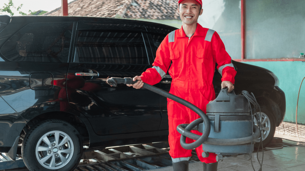 Cleaning car using vacuum 